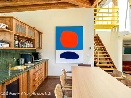 a bathroom with a sink a toilet and bathtub