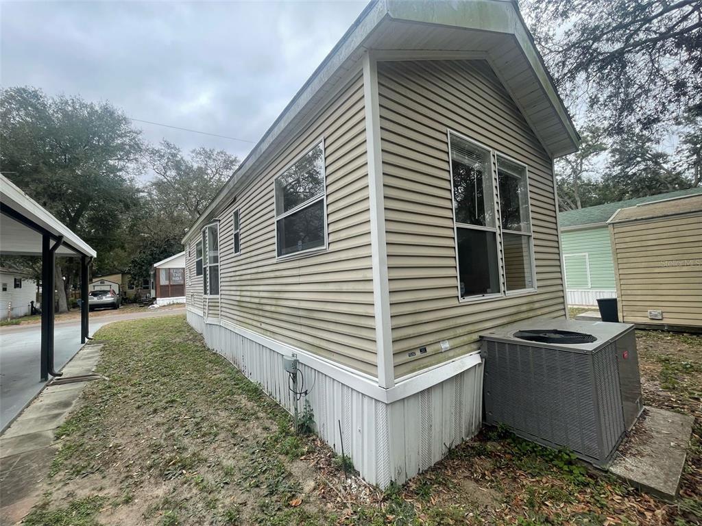 3000 Clarcona Road, Unit 830 Apopka, FL 32703 - Photo 31 of 31 a view of a house with a yard