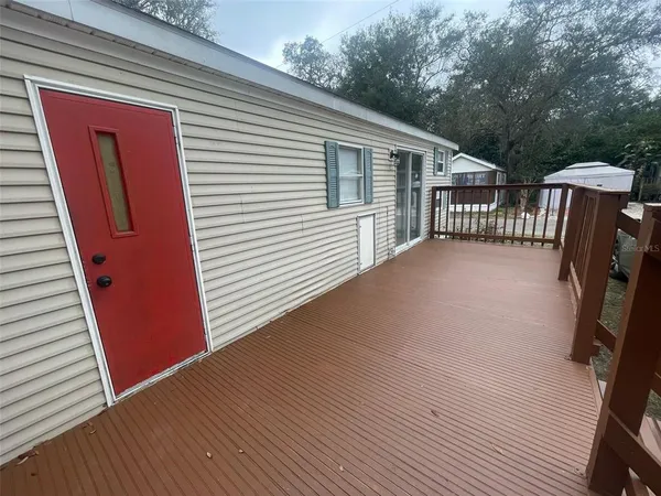 a view of a house with a deck