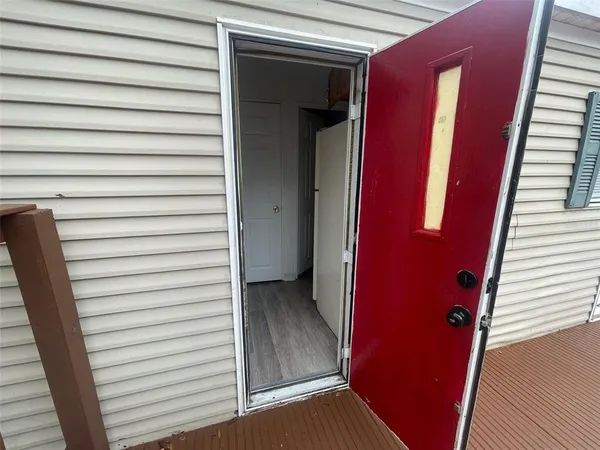 a view of a hallway with entryway