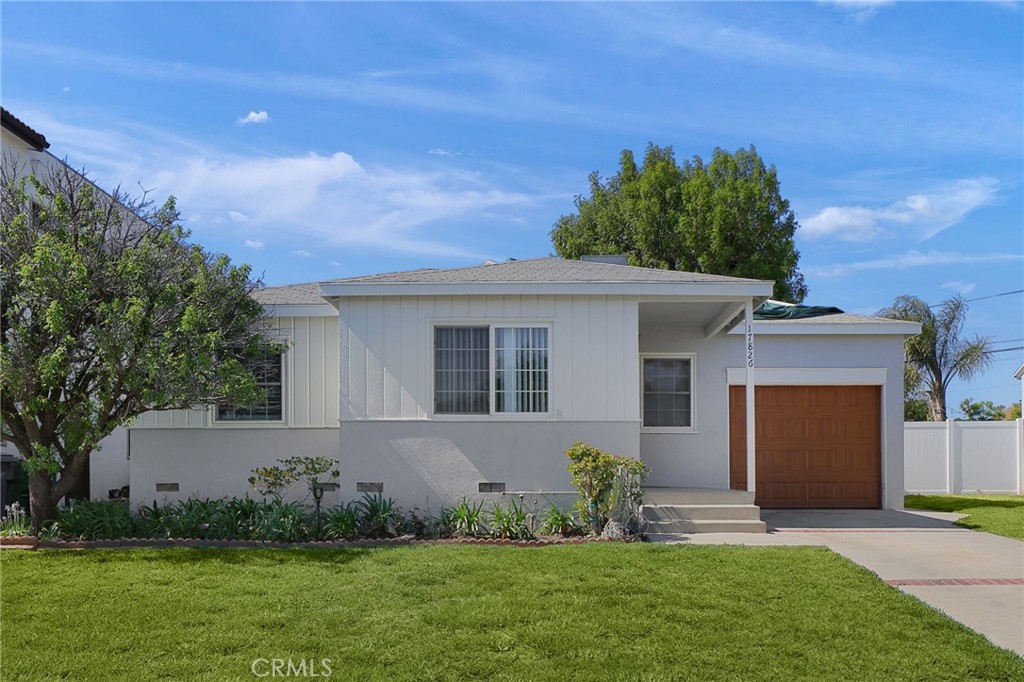 17826 Rhoda Street Encino, CA 91316 - Photo 1 of 1 front view of a house with a yard