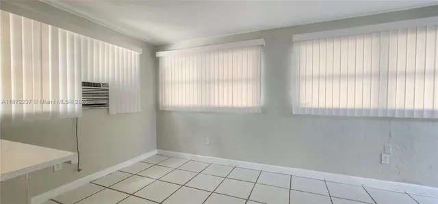 a view of an empty room with window