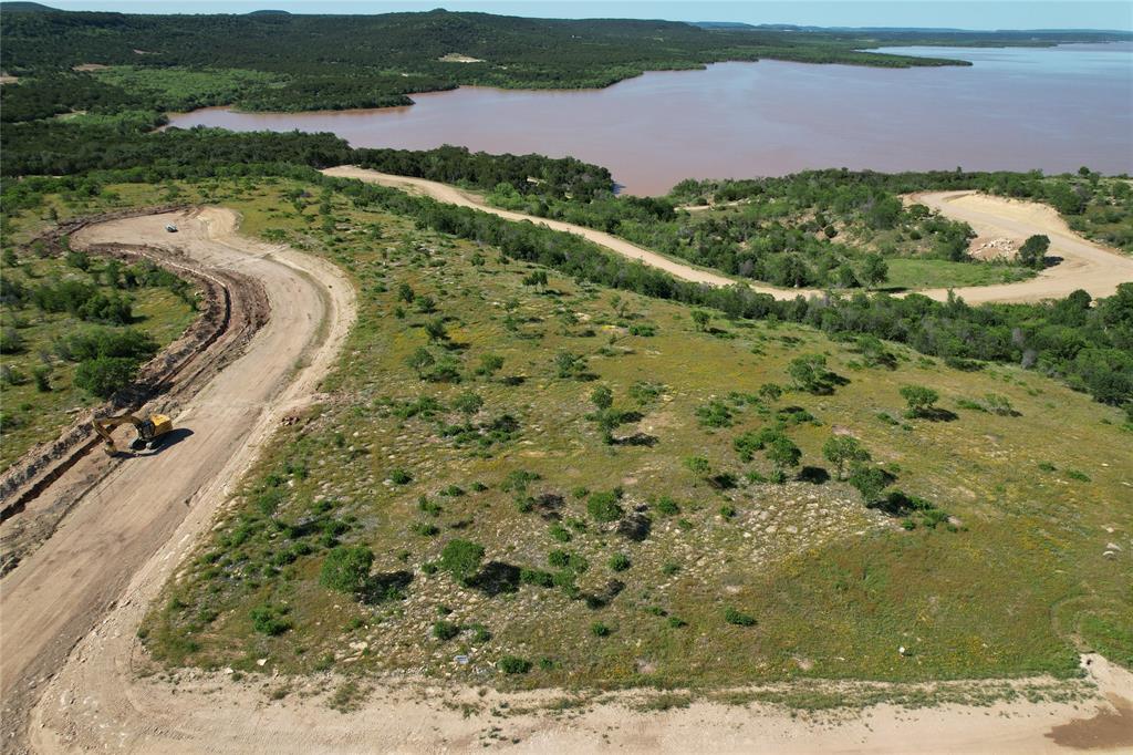 0 Water Lilly Lane Graham, TX 76450 - Photo 2 of 3 a view of a lake with a mountain in the background