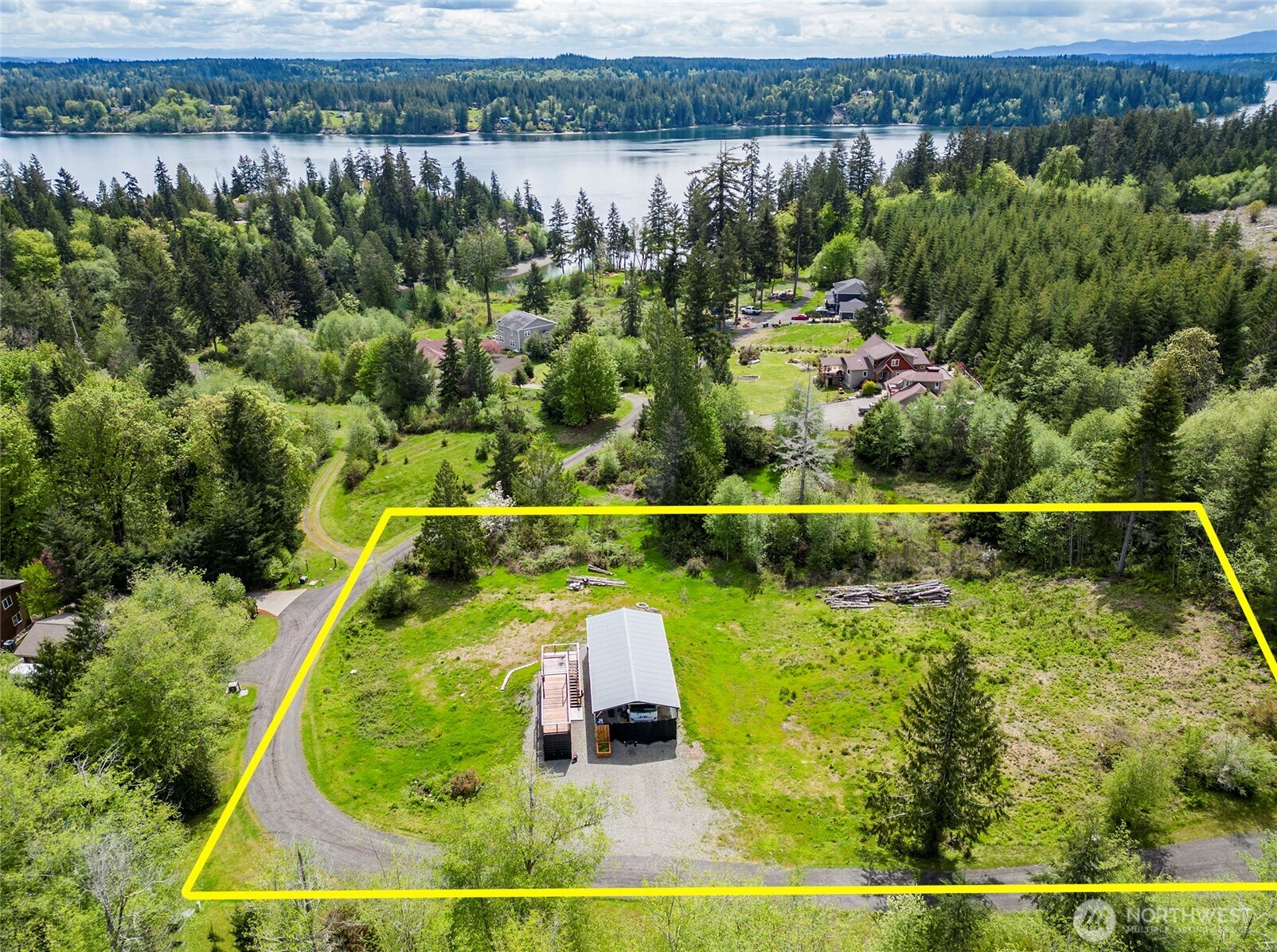 770 East April Avenue Grapeview, WA 98546 - Photo 12 of 16 view of a lake with houses