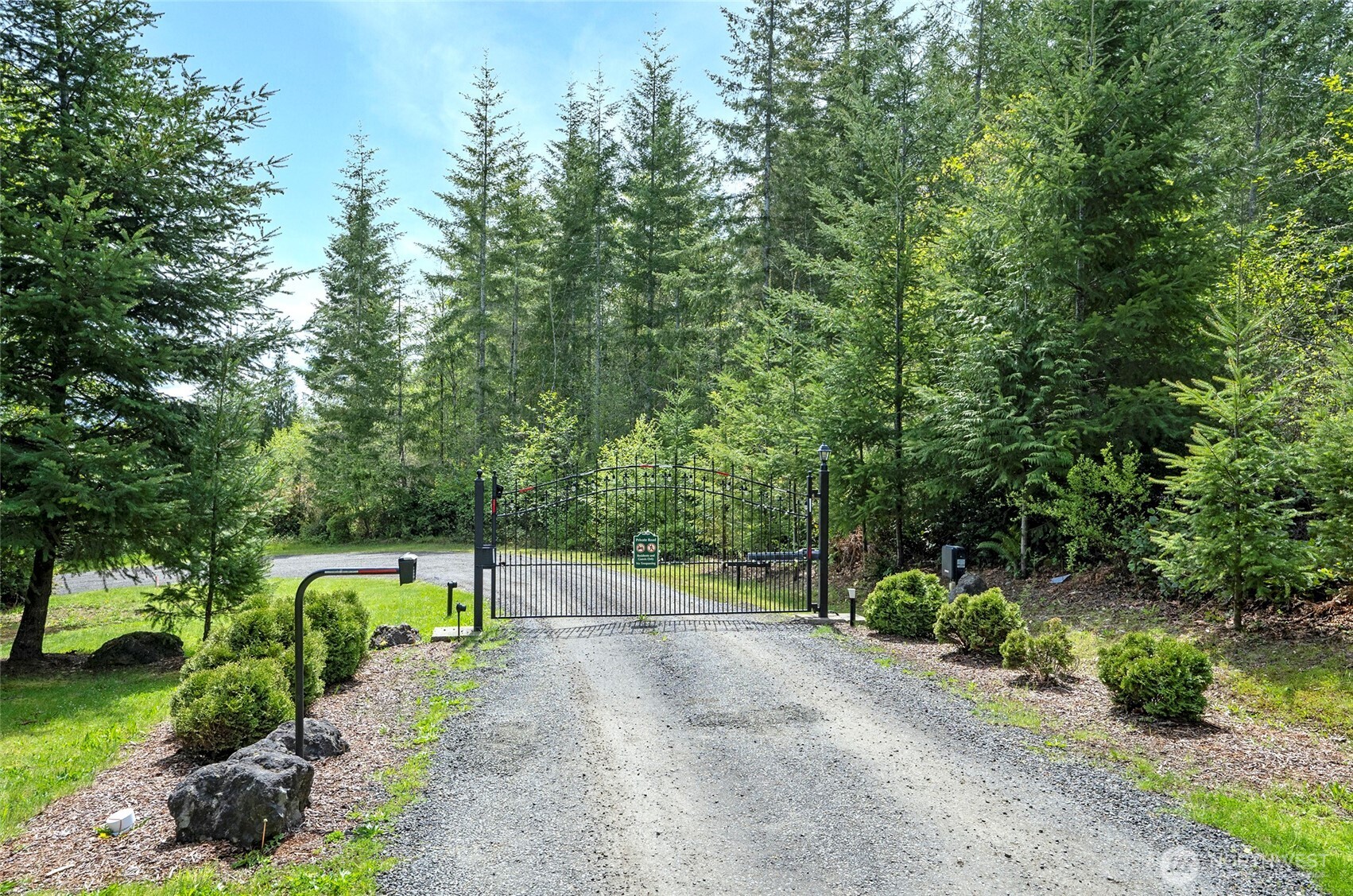 770 East April Avenue Grapeview, WA 98546 - Photo 4 of 16 a view of a park with large trees