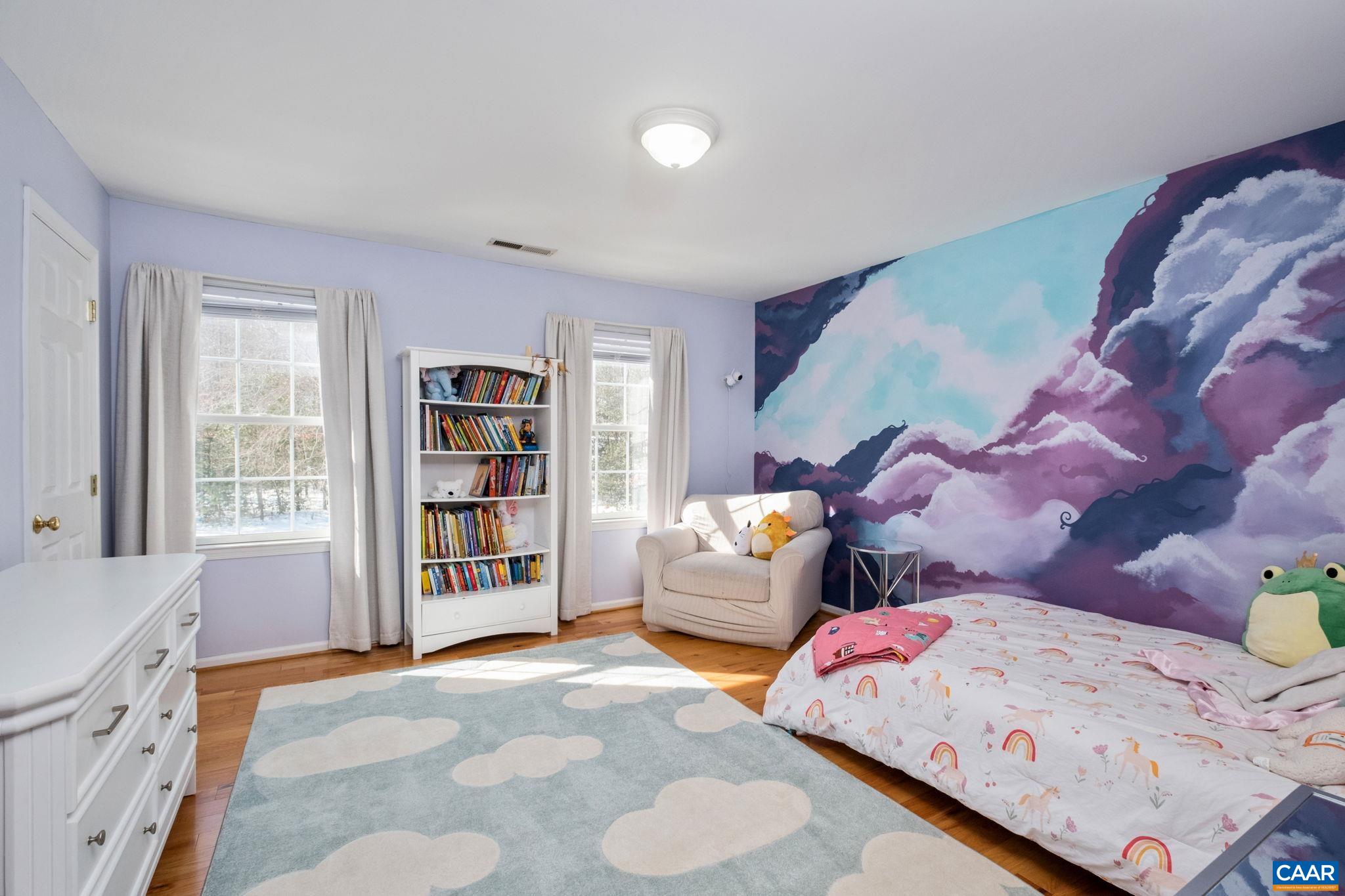 237 Spring Haven Lane Ruckersville, VA 22968 - Photo 20 of 41 a bedroom with furniture and a book shelf