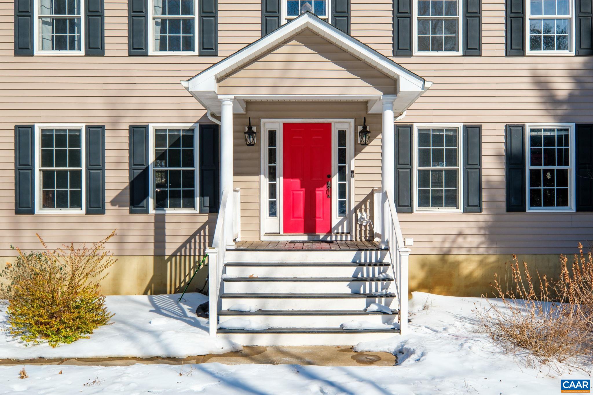 237 Spring Haven Lane Ruckersville, VA 22968 - Photo 2 of 41 a front view of a house with a lots of windows and plants