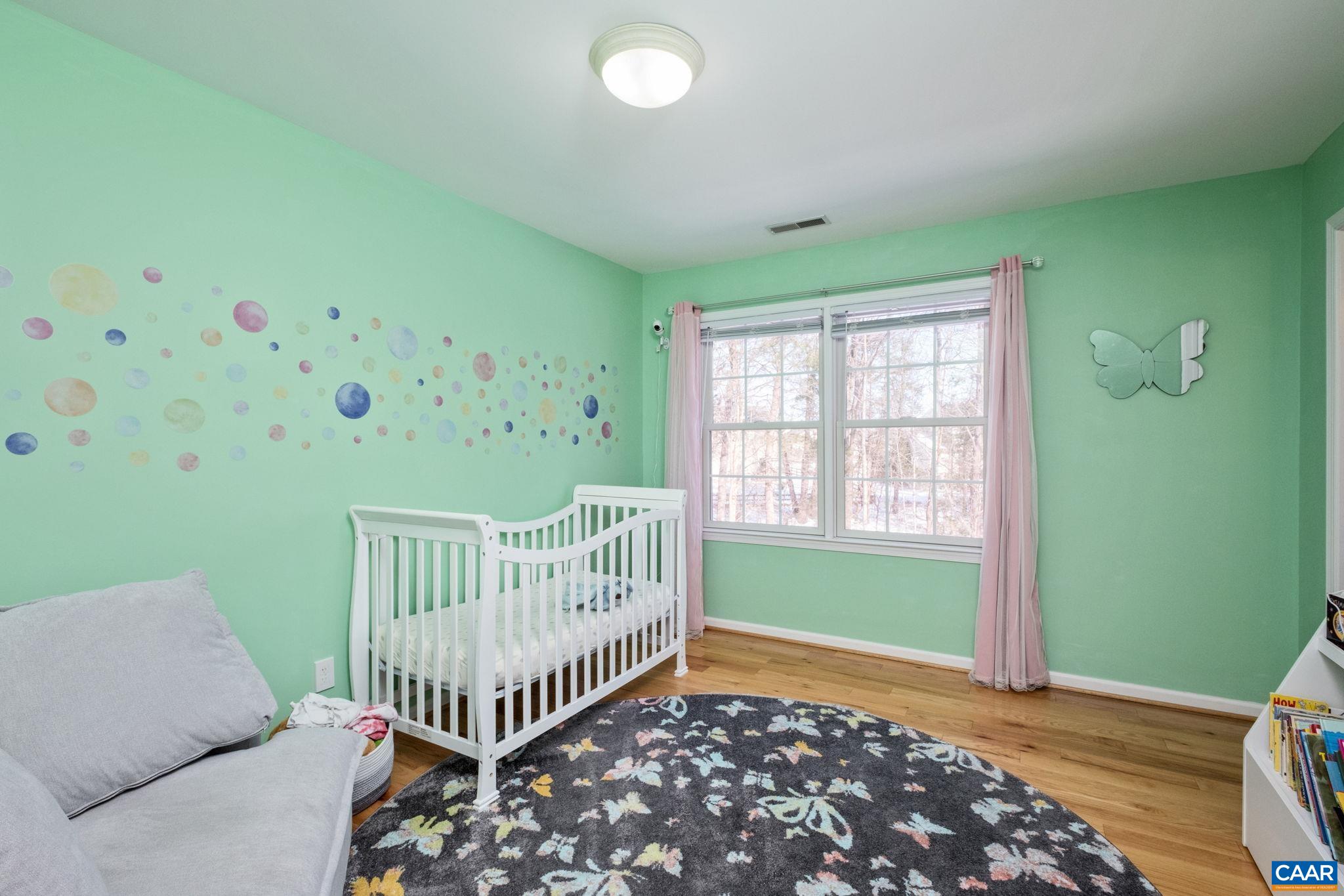 237 Spring Haven Lane Ruckersville, VA 22968 - Photo 23 of 41 a bedroom with furniture and a window
