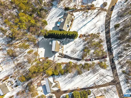 a view of a house with a tree