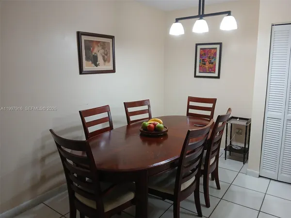 a view of a dining room with furniture