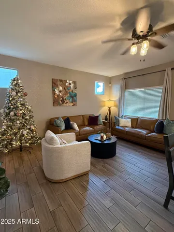 a living room with furniture and a couch