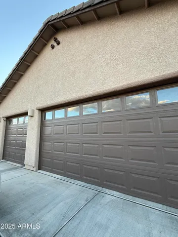 a large kitchen with lots of counter space a sink and appliances