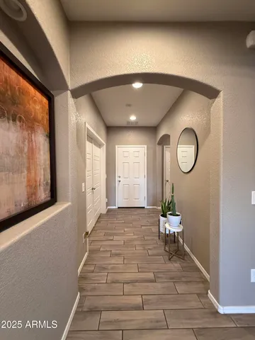 a view of a livingroom with furniture and wooden floor