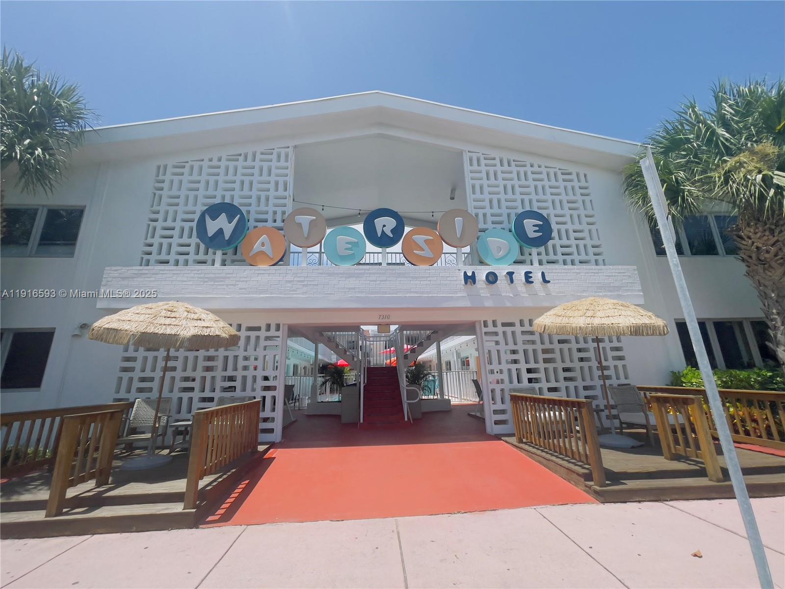 7310 Harding Avenue, Unit 318 Miami Beach, FL 33141 - Photo 1 of 6 a picture of outdoor space with porch