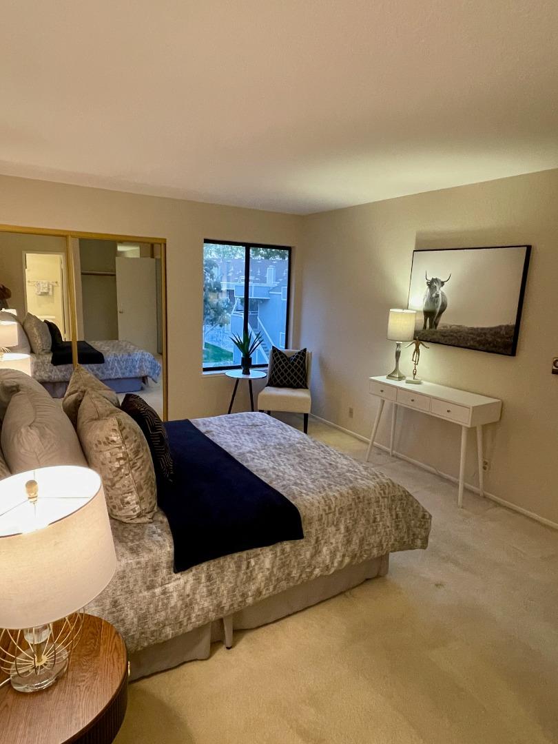 862 La Barbera Drive San Jose, CA 95126 - Photo 15 of 29 a bedroom with a bed and window