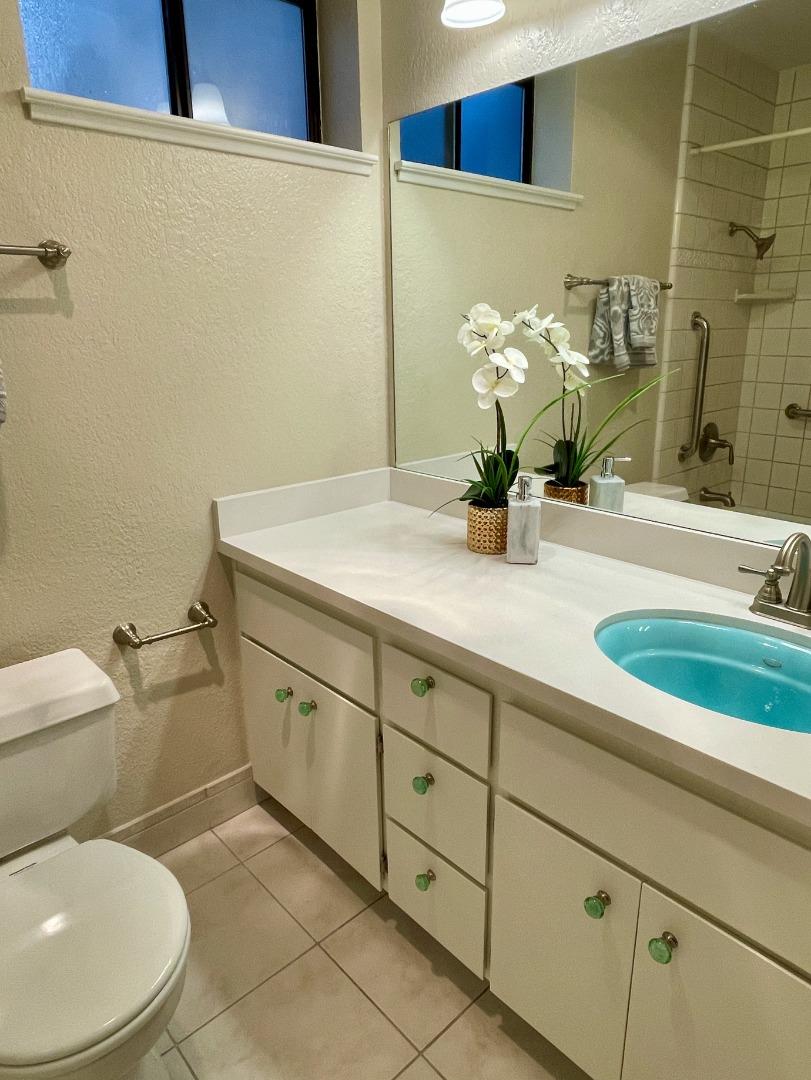862 La Barbera Drive San Jose, CA 95126 - Photo 18 of 29 a bathroom with a granite countertop toilet sink and mirror