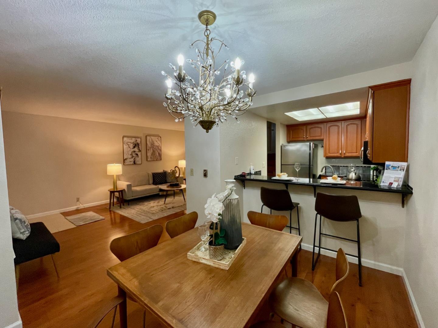862 La Barbera Drive San Jose, CA 95126 - Photo 8 of 29 a view of a dining room with furniture and wooden floor