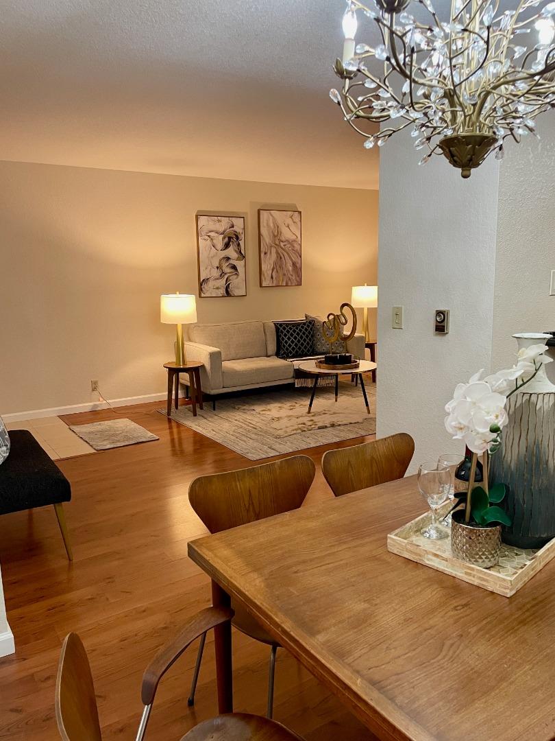 862 La Barbera Drive San Jose, CA 95126 - Photo 9 of 29 a room with table chairs and a chandelier