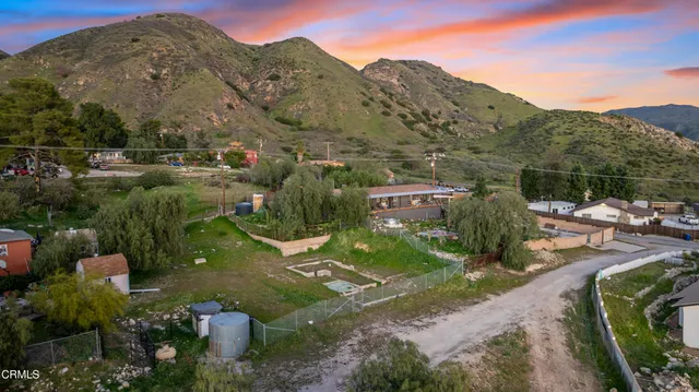 a view of a street with a houses