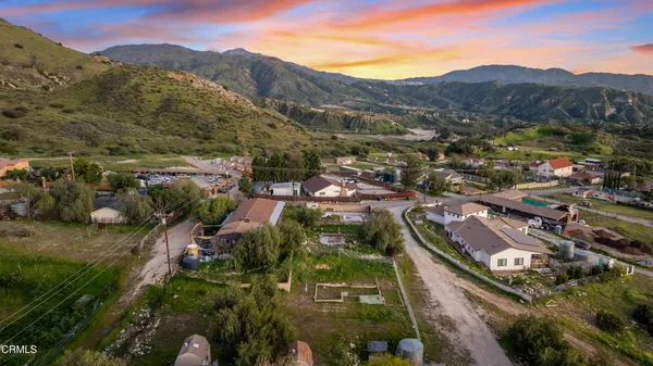 a view of a city with mountains in the background