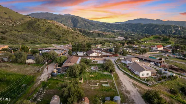 a view of a city with mountains in the background