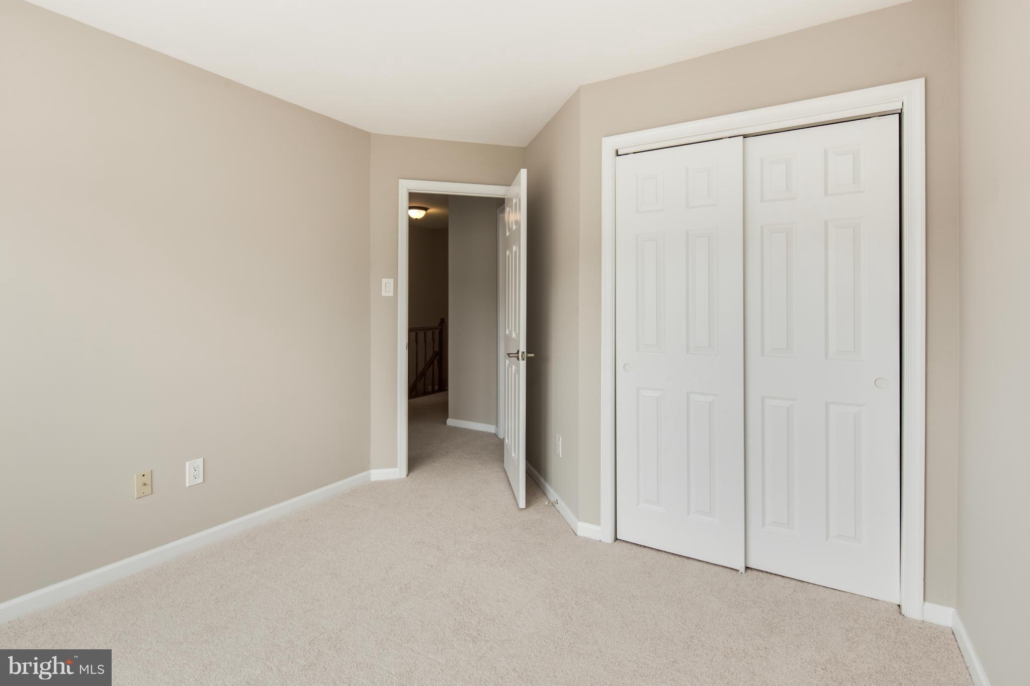 46871 Rabbitrun Terrace Sterling, VA 20164 - Photo 18 of 30 a view of an empty room and closet area