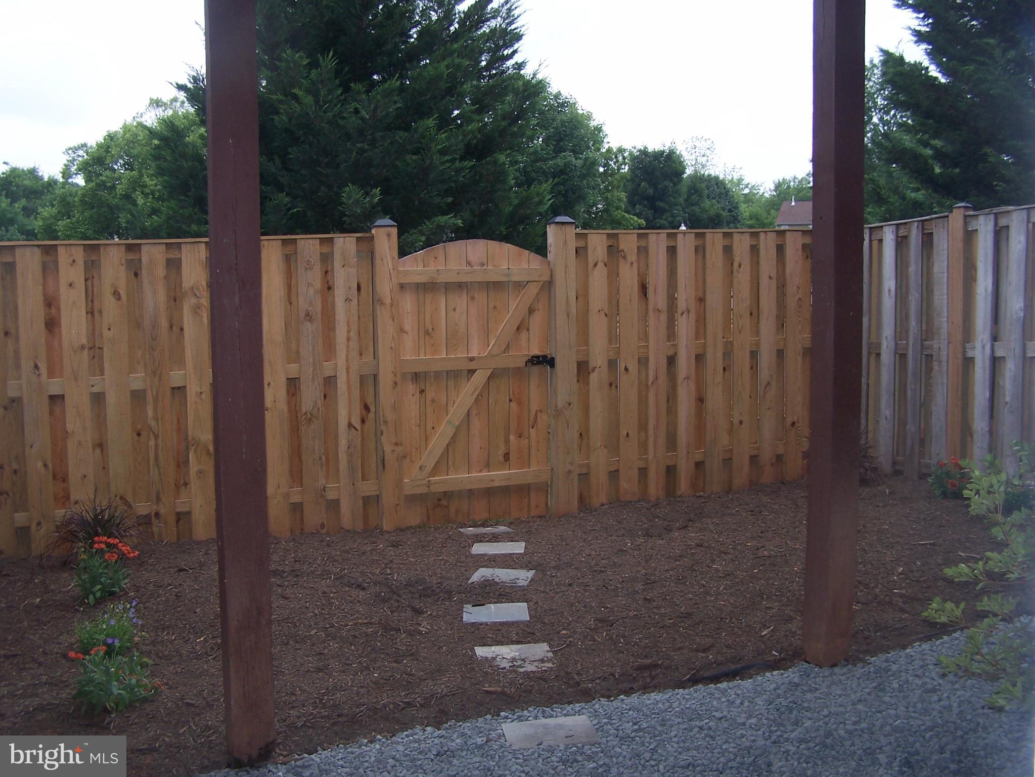46871 Rabbitrun Terrace Sterling, VA 20164 - Photo 30 of 30 a view of yard with wooden fence