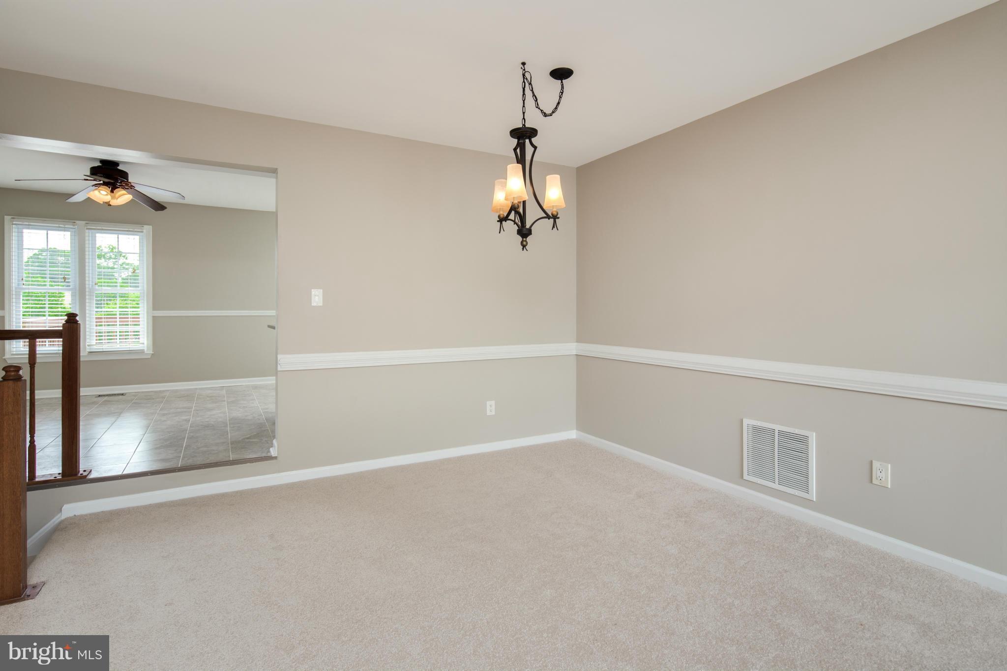 46871 Rabbitrun Terrace Sterling, VA 20164 - Photo 5 of 30 wooden floor in an empty room with a window