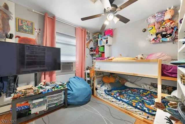 a room with toys and flat screen tv
