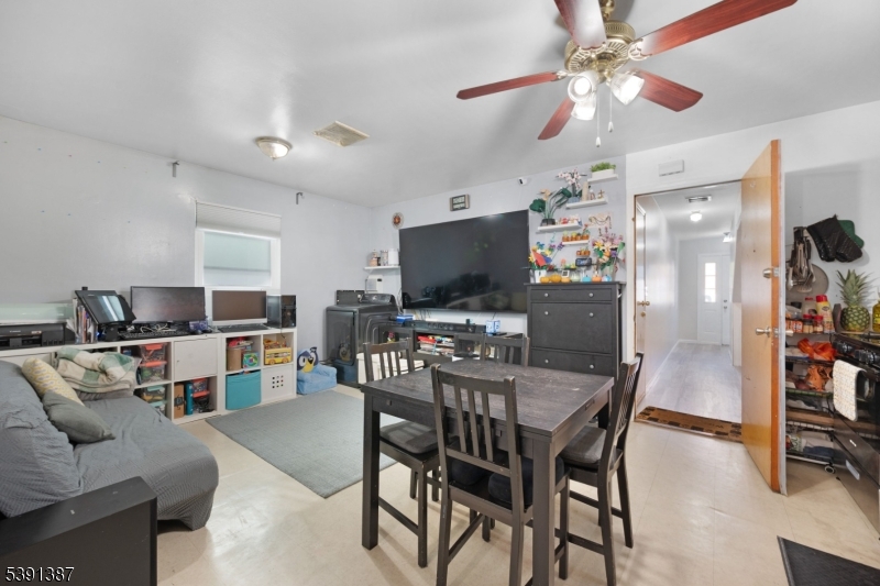 566 2nd Avenue Elizabeth, NJ 07202 - Photo 7 of 38 a view of a dining room with furniture