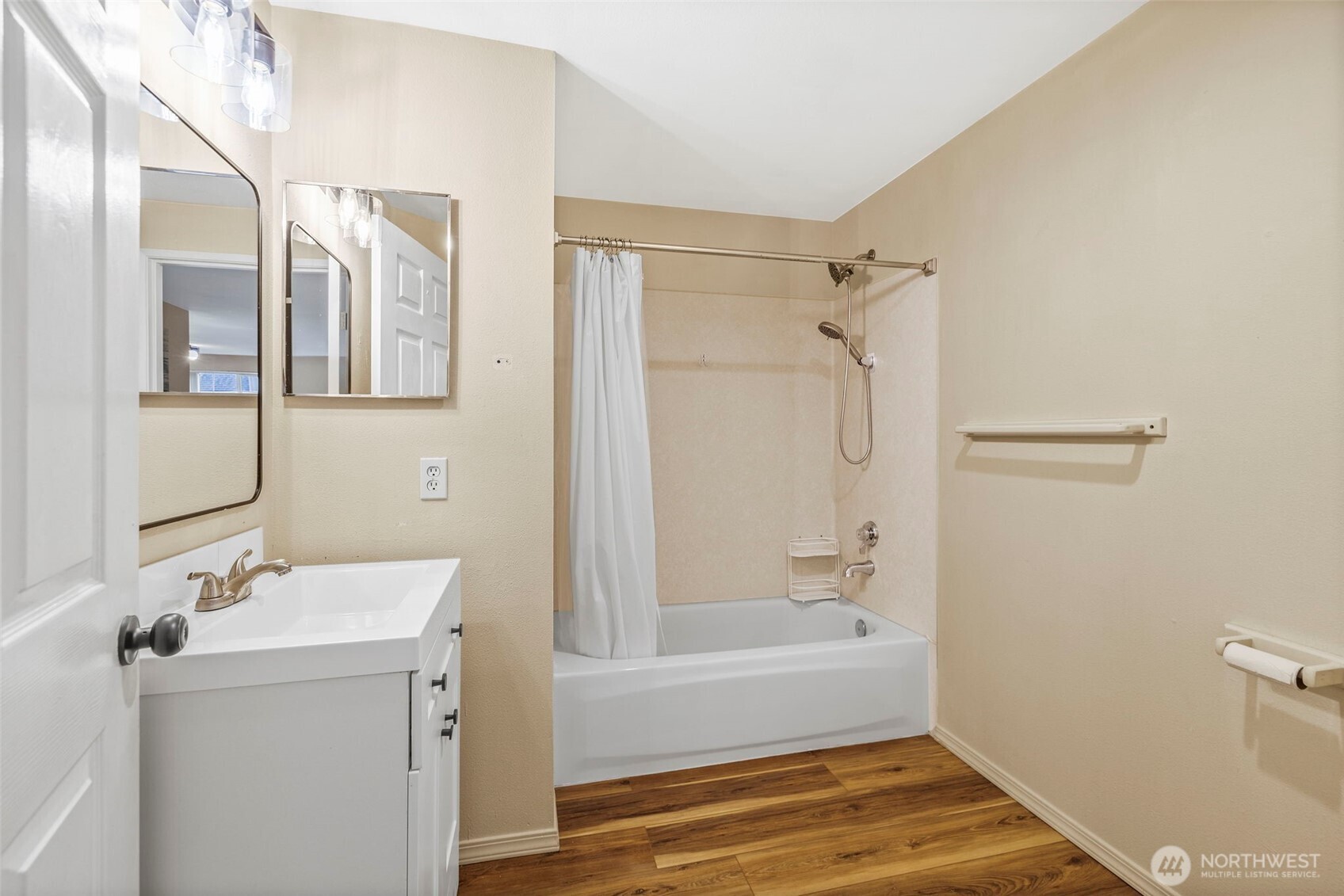 10824 Southeast 170th Street, Unit B103 Renton, WA 98055 - Photo 23 of 31 a bathroom with a bathtub and shower