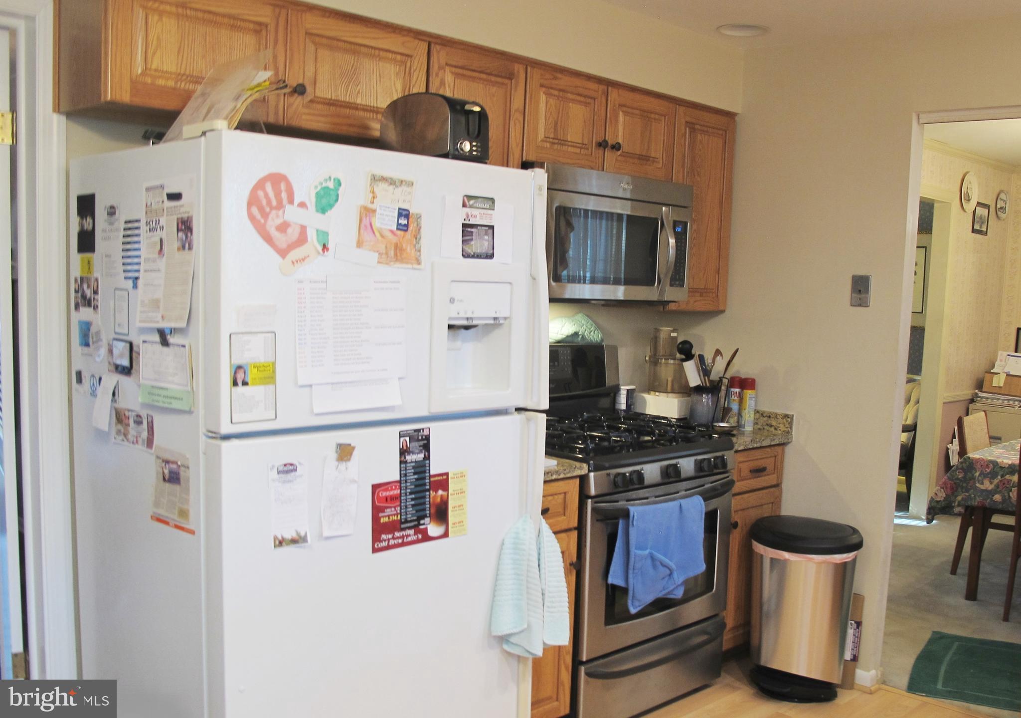 164 Oxford Road Delran, NJ 08075 - Photo 16 of 38 a white refrigerator freezer sitting inside of a kitchen
