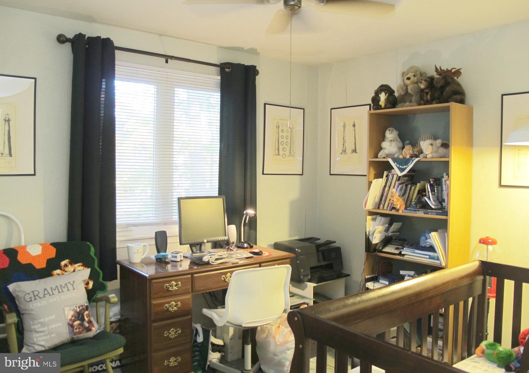 164 Oxford Road Delran, NJ 08075 - Photo 29 of 38 a view of a workspace with furniture and a window