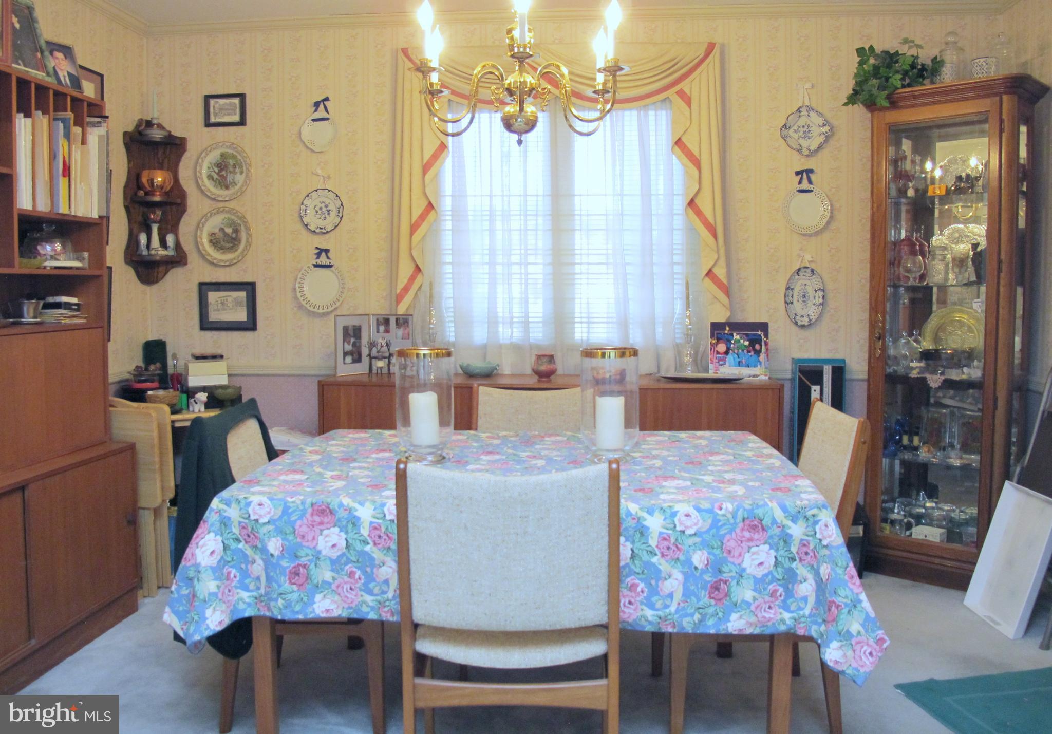 164 Oxford Road Delran, NJ 08075 - Photo 8 of 38 a bed room with a bed a table chair and a window