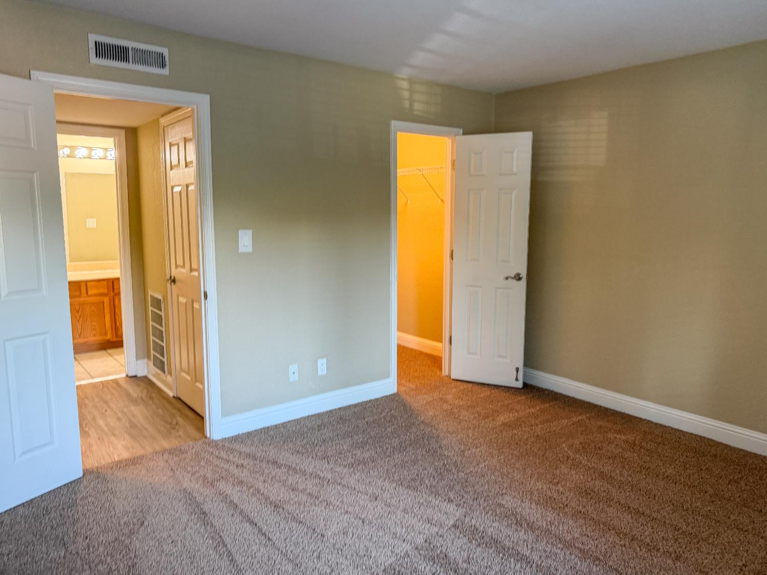 2881 Huntington Boulevard, Unit 150 Fresno, CA 93721 - Photo 7 of 15 an empty room with a bathroom and a bathroom