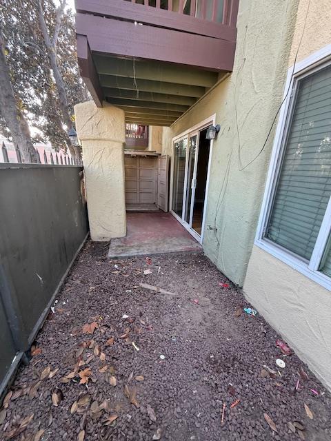 2881 Huntington Boulevard, Unit 150 Fresno, CA 93721 - Photo 9 of 15 a view of empty room with wooden walls