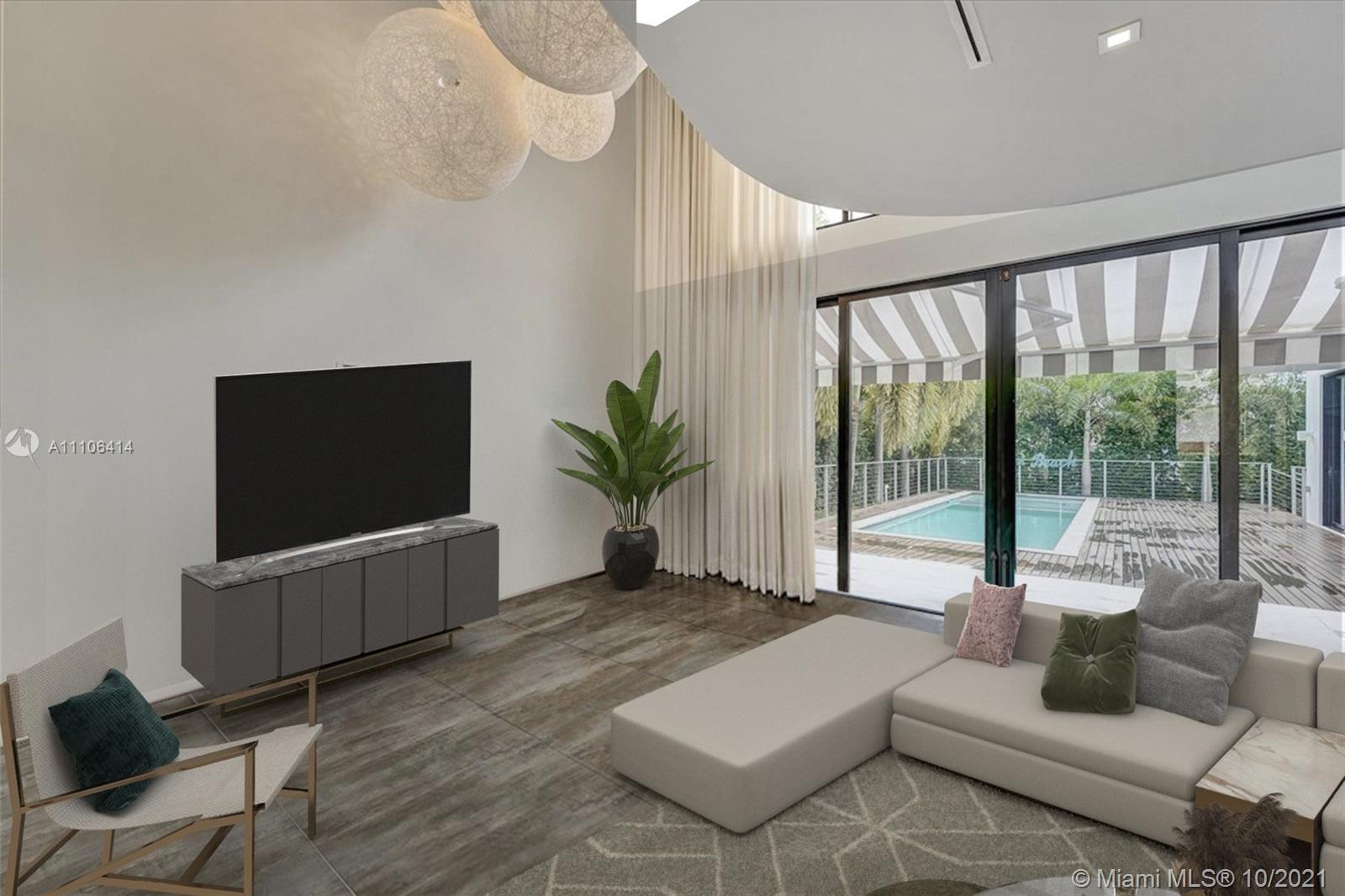 2125 North Bay Road Miami Beach, FL 33140 - Photo 12 of 71 a living room with furniture and a flat screen tv