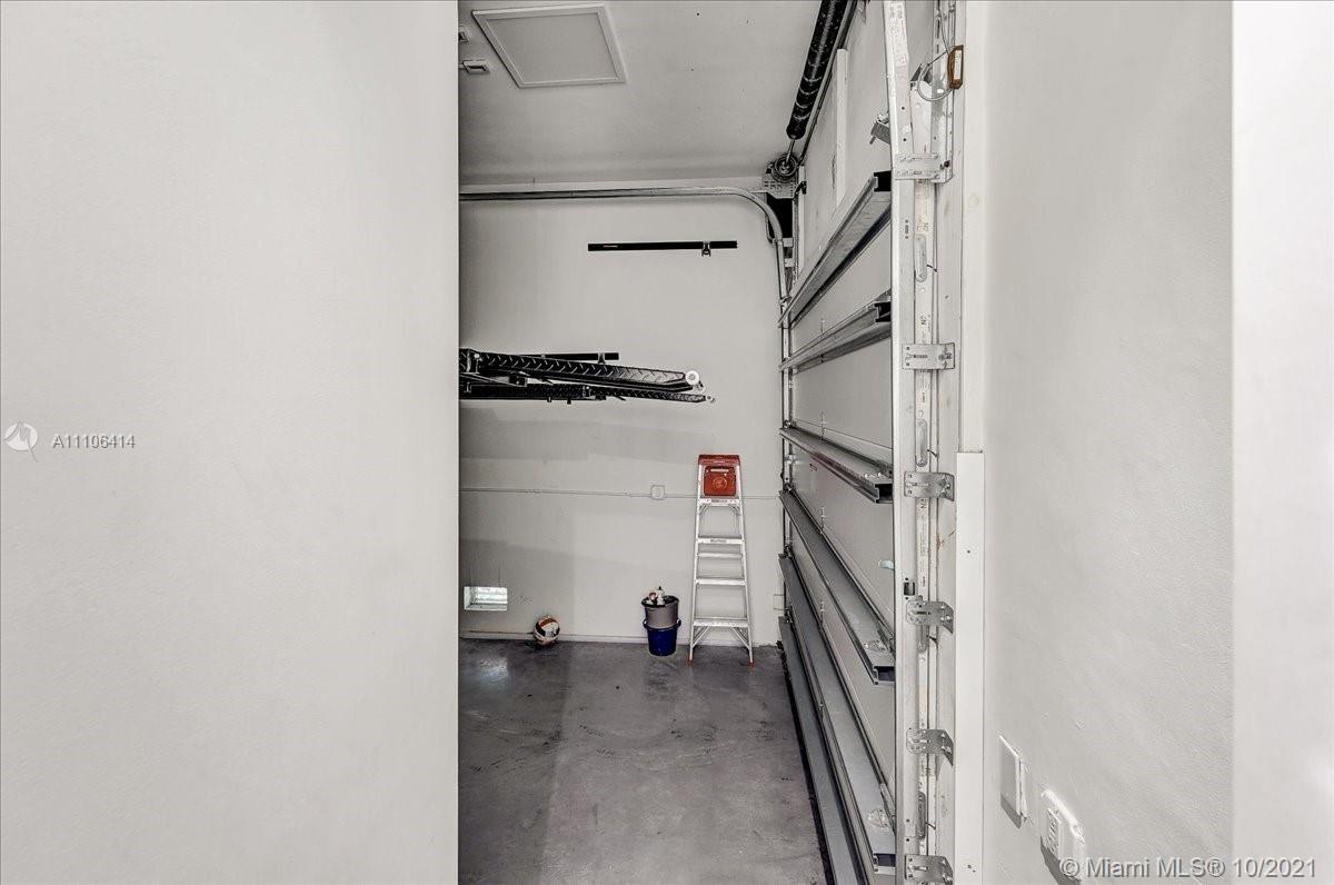 2125 North Bay Road Miami Beach, FL 33140 - Photo 30 of 71 a view of an empty walk in closet