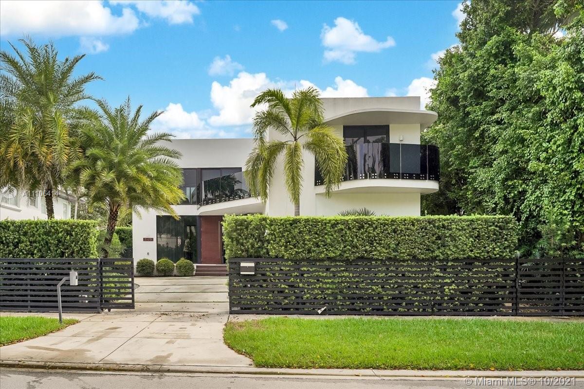 2125 North Bay Road Miami Beach, FL 33140 - Photo 5 of 71 a front view of a house with garden