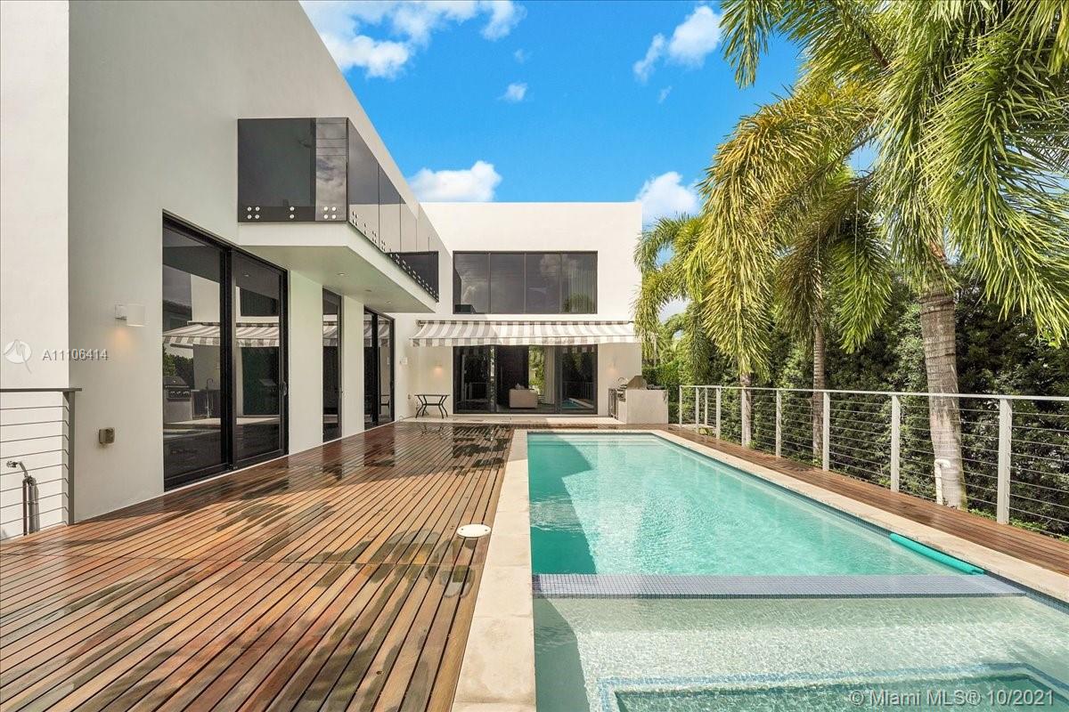 2125 North Bay Road Miami Beach, FL 33140 - Photo 60 of 71 a view of a house with swimming pool