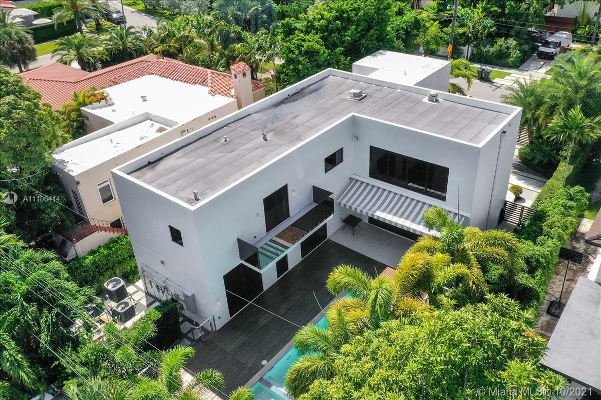 2125 North Bay Road Miami Beach, FL 33140 - Photo 69 of 71 a view of a house with a yard and deck