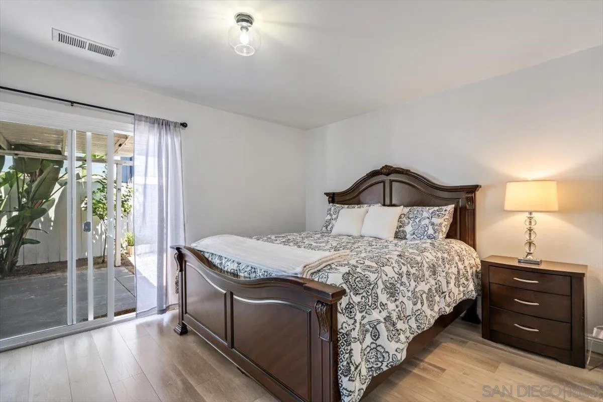 2019 Bridgeport Chula Vista, CA 91913 - Photo 15 of 32 a bedroom with a bed and a window
