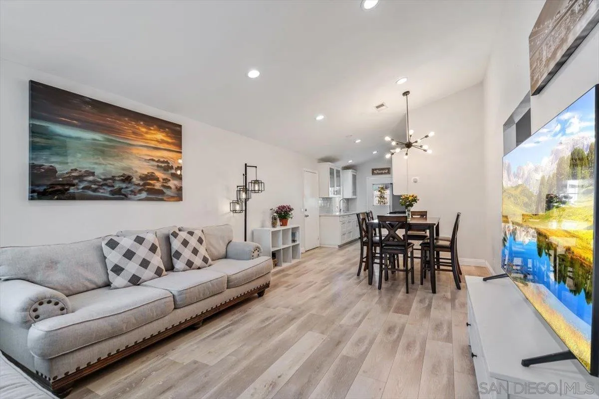 2019 Bridgeport Chula Vista, CA 91913 - Photo 2 of 32 a living room with furniture and wooden floor