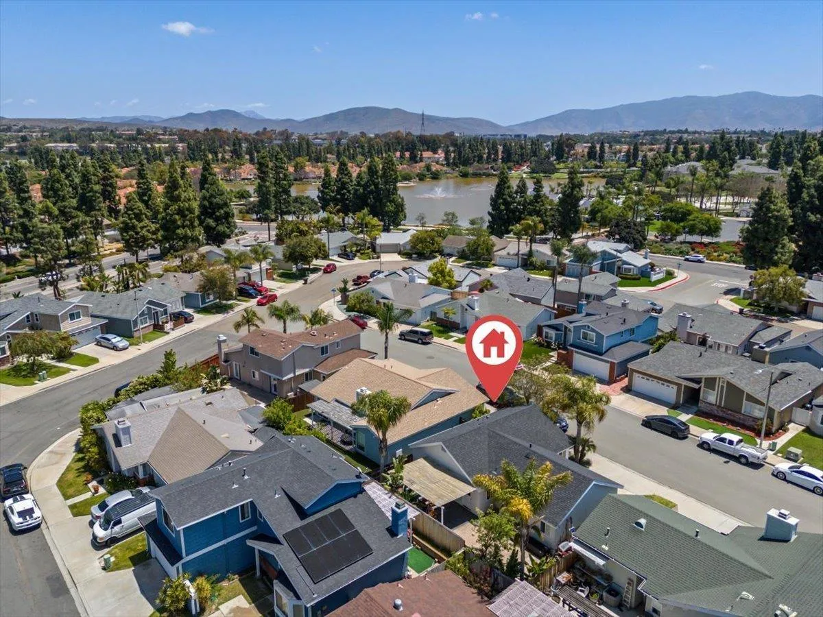 2019 Bridgeport Chula Vista, CA 91913 - Photo 25 of 32 an aerial view of a houses with a swimming pool
