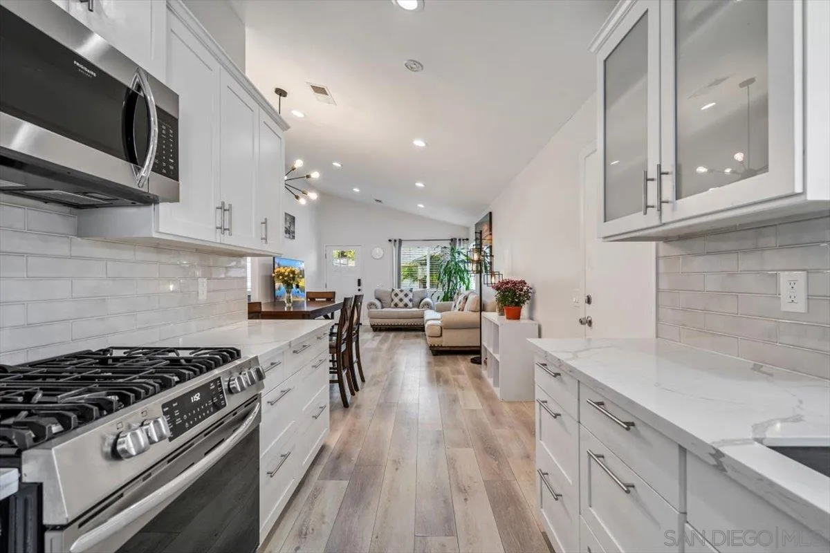 2019 Bridgeport Chula Vista, CA 91913 - Photo 8 of 32 a kitchen with stove and cabinets