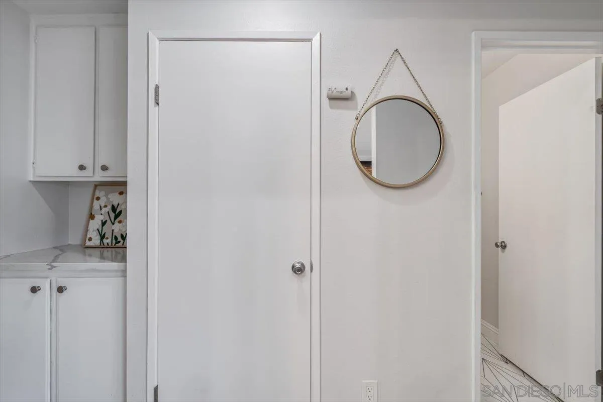 2019 Bridgeport Chula Vista, CA 91913 - Photo 10 of 32 a bathroom with a sink and a mirror