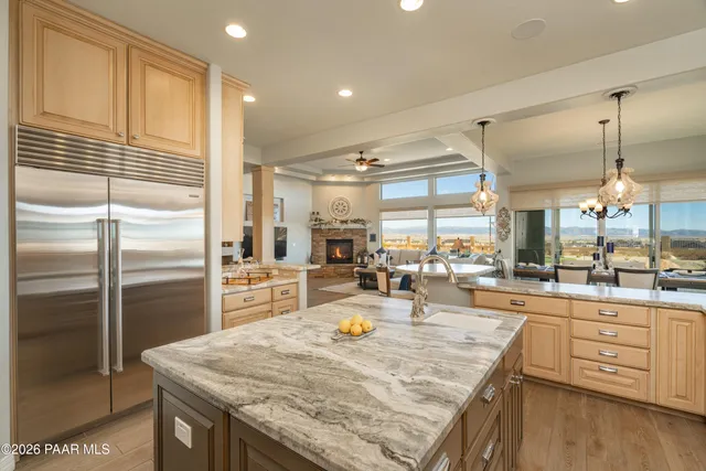 a bathroom with a granite countertop sink a mirror and a