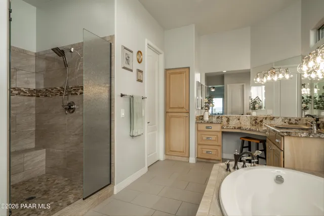 an aerial view of residential houses and outdoor space