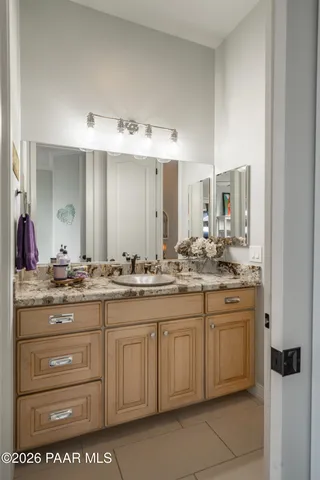 a view of a backyard with sitting area