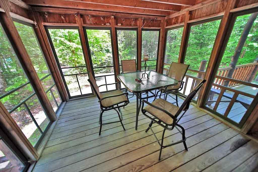 323 Sandy Beach Road Danforth, ME 04424 - Photo 7 of 81 deck-screened-in-vacation-h